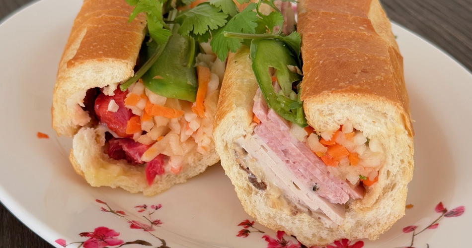 https://www.vpopwire.com/wp-content/uploads/2025/01/banh-mi-vietnamese-baguette-sandwich-recipe.jpg